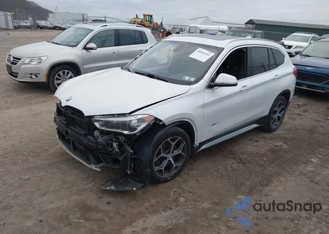 2017 BMW X1 xDrive28I z USA, uszkodzony, nr VIN WBXHT3C31H5F81871